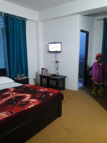 Пеллинг: Ravangla Hotel Happy Home