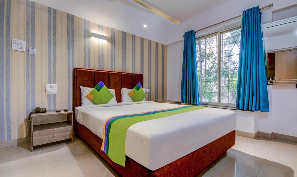 Пуна: Treebo Iris Suites