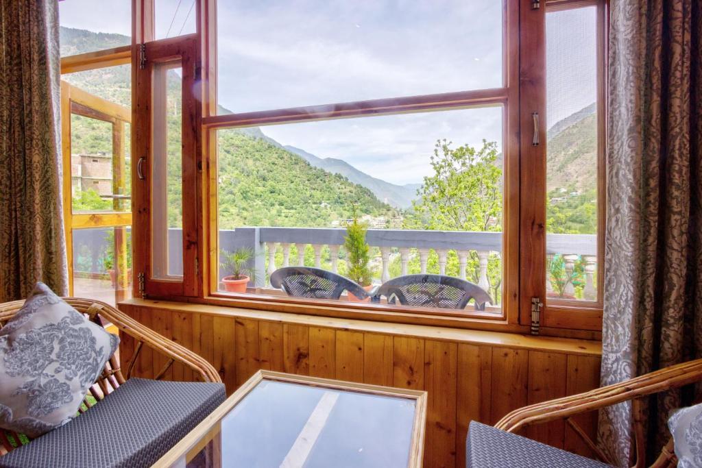 Банджар: Doris Mountain Cabins Tirthan