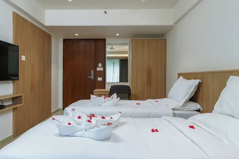 Коччи: The Trios Hotel