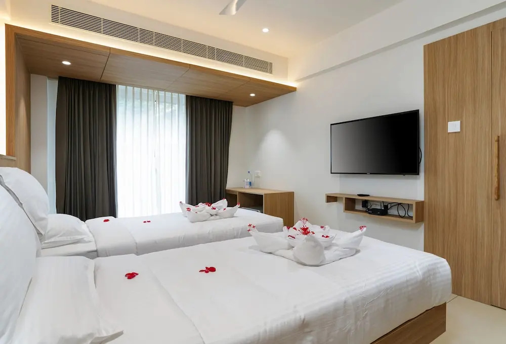 Коччи: The Trios Hotel