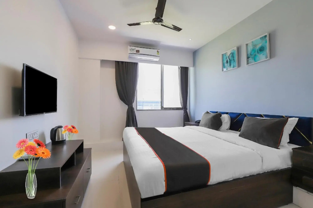 Сурат: Capital O 87586 Hotel Code