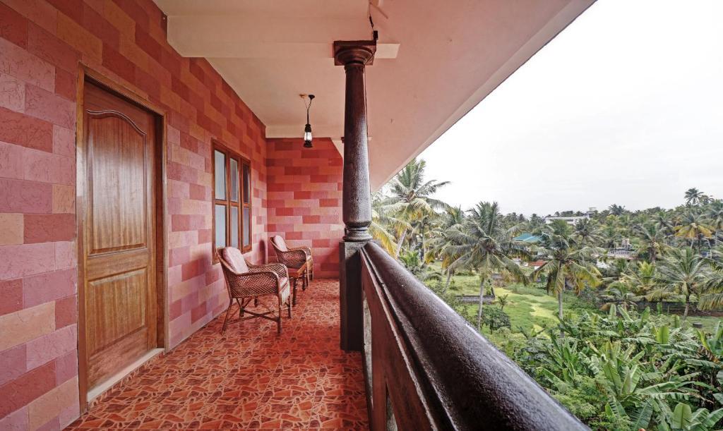Ковалам: Treebo Trend Green Palm Resorts