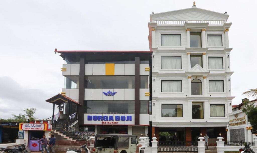 Полибетта: Treebo Trend Durga Boji Grand Gonikoppal Town