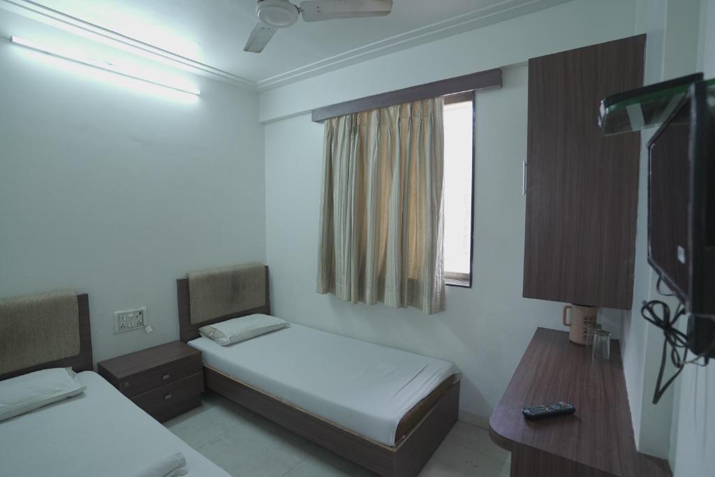 Мумбаи: Hotel Delight Inn By WB Inn