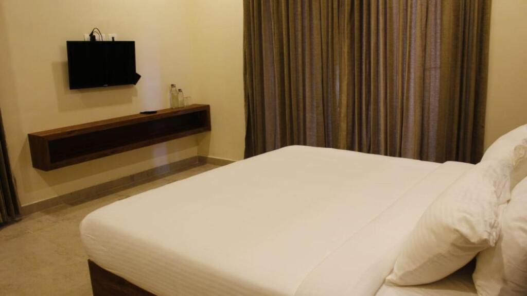 Муннар: Elixir Hills Suite Hotel and Spa