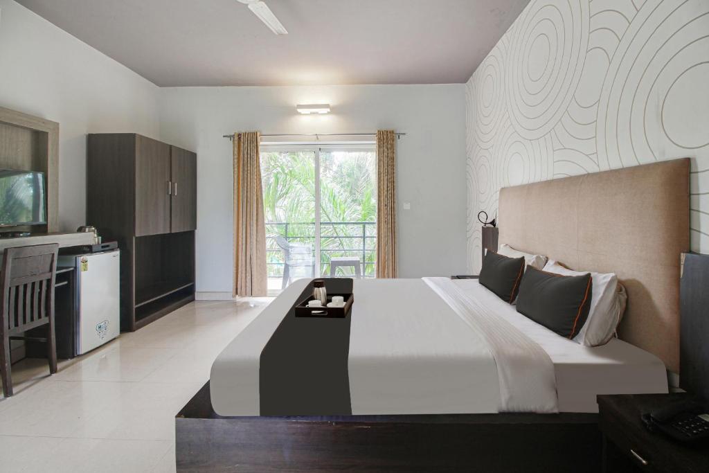 Морджим: Capital O 91277 Inn Resort