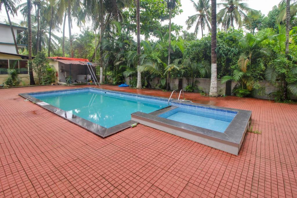 Морджим: Capital O 91277 Inn Resort