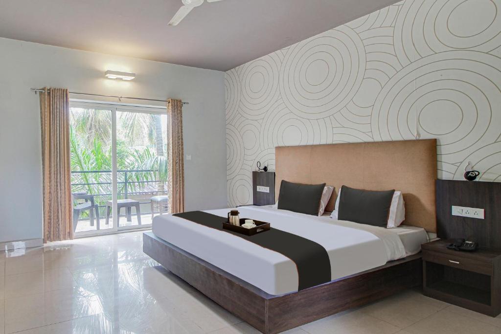 Морджим: Capital O 91277 Inn Resort