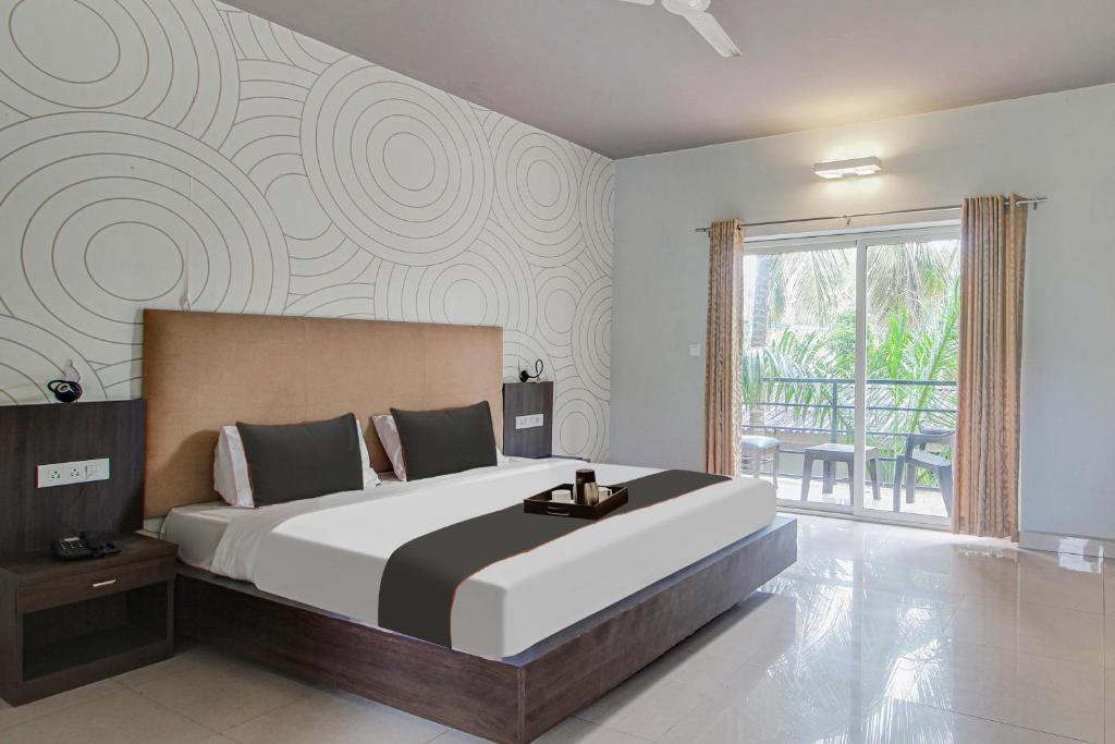 Морджим: Capital O 91277 Inn Resort