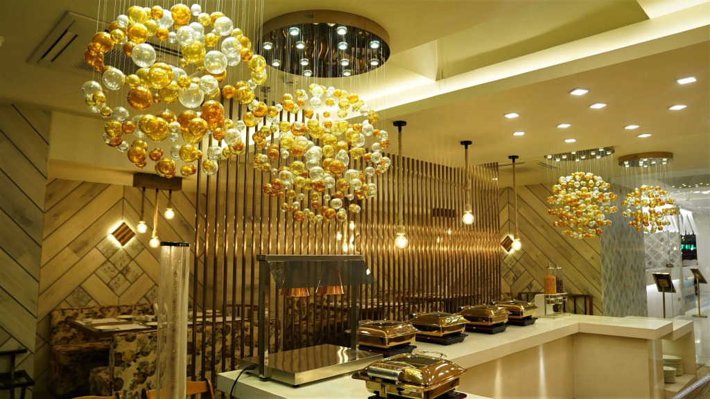Сурат: De Glance Hotel