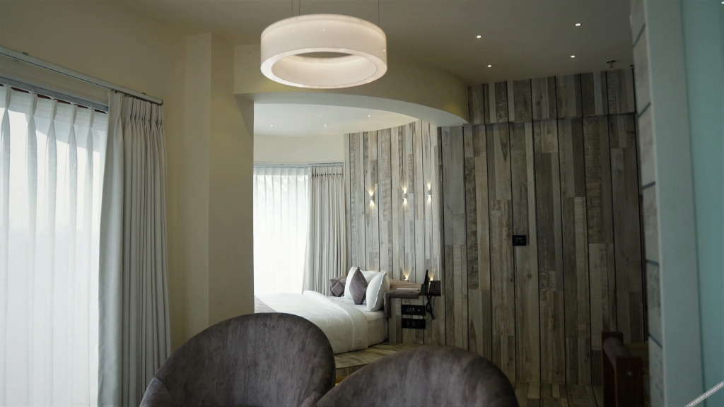 Сурат: De Glance Hotel