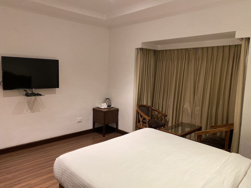 Ути: Hotel Glanton Manor
