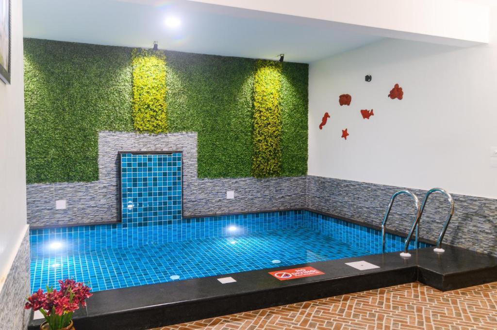 Альто-де-Порворим: Lotus & Orchid Villas by Ramnath Homes