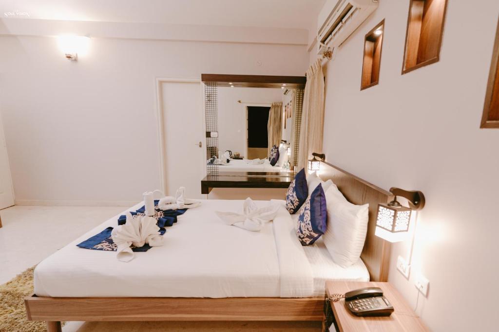Бангалор: Athulya Square Rooms