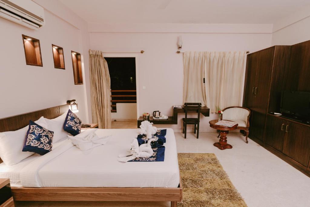 Бангалор: Athulya Square Rooms