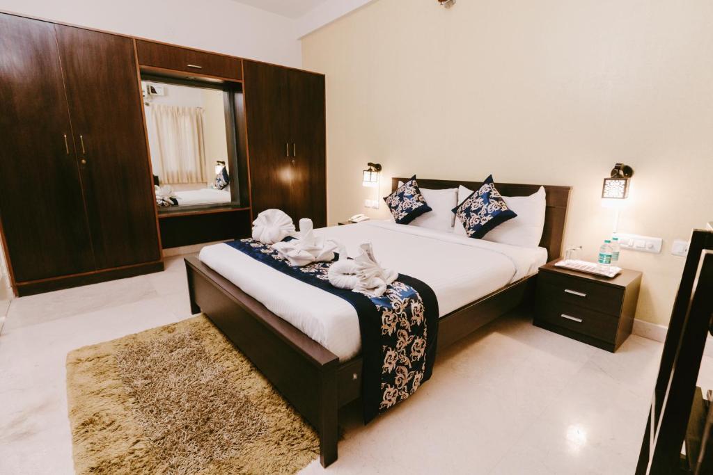Бангалор: Athulya Square Rooms