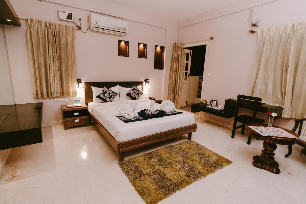 Бангалор: Athulya Square Rooms