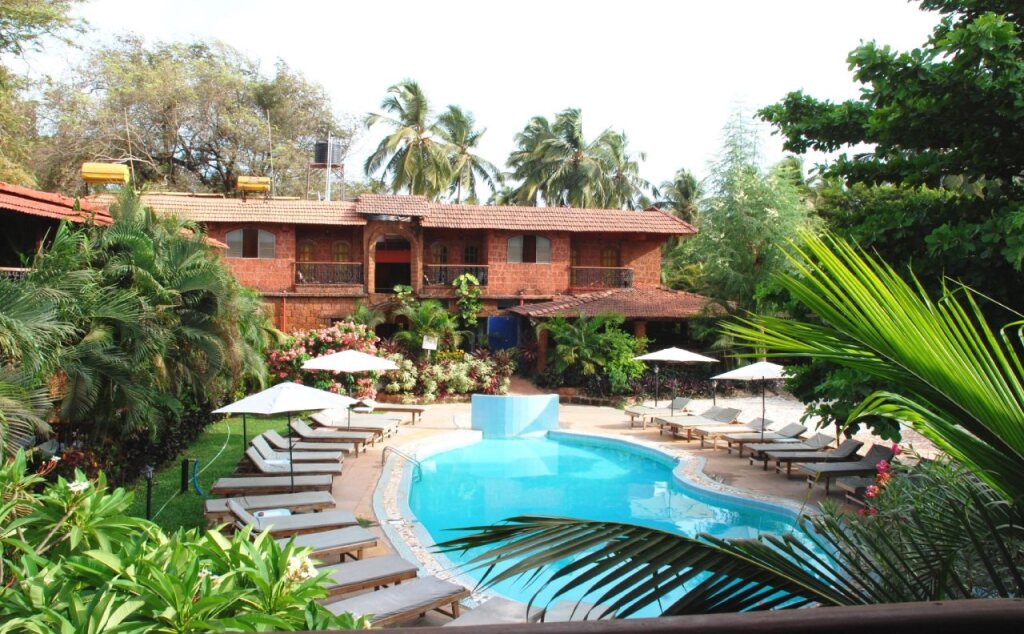 Кандолим: Capital O 322 Sea Breeze Candolim Hotel