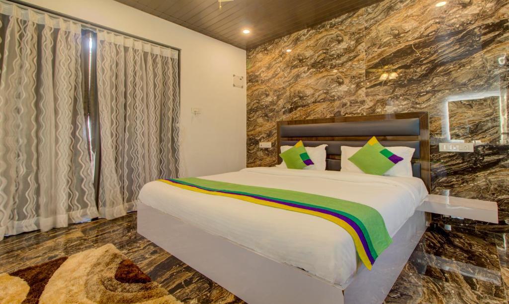 Морджим: Treebo La Prince Suites
