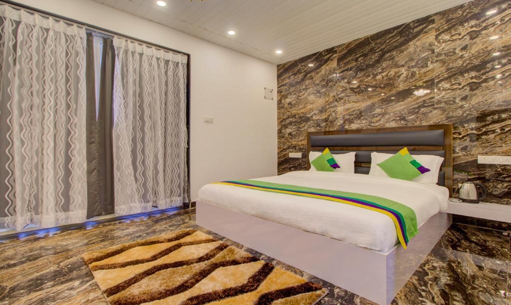 Морджим: Treebo La Prince Suites