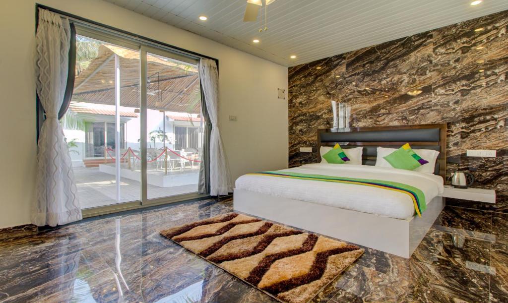 Морджим: Treebo La Prince Suites