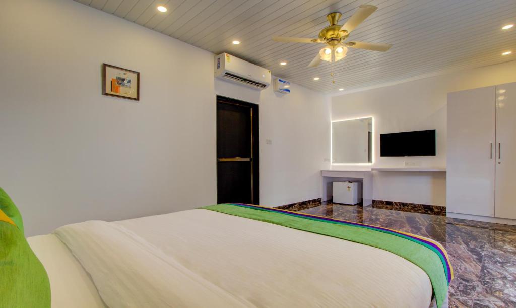 Морджим: Treebo La Prince Suites