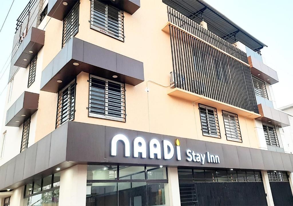 Солагампатти: Naadi stayinn New Busstand Thanjavur