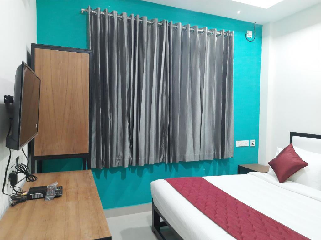 Солагампатти: Naadi stayinn New Busstand Thanjavur