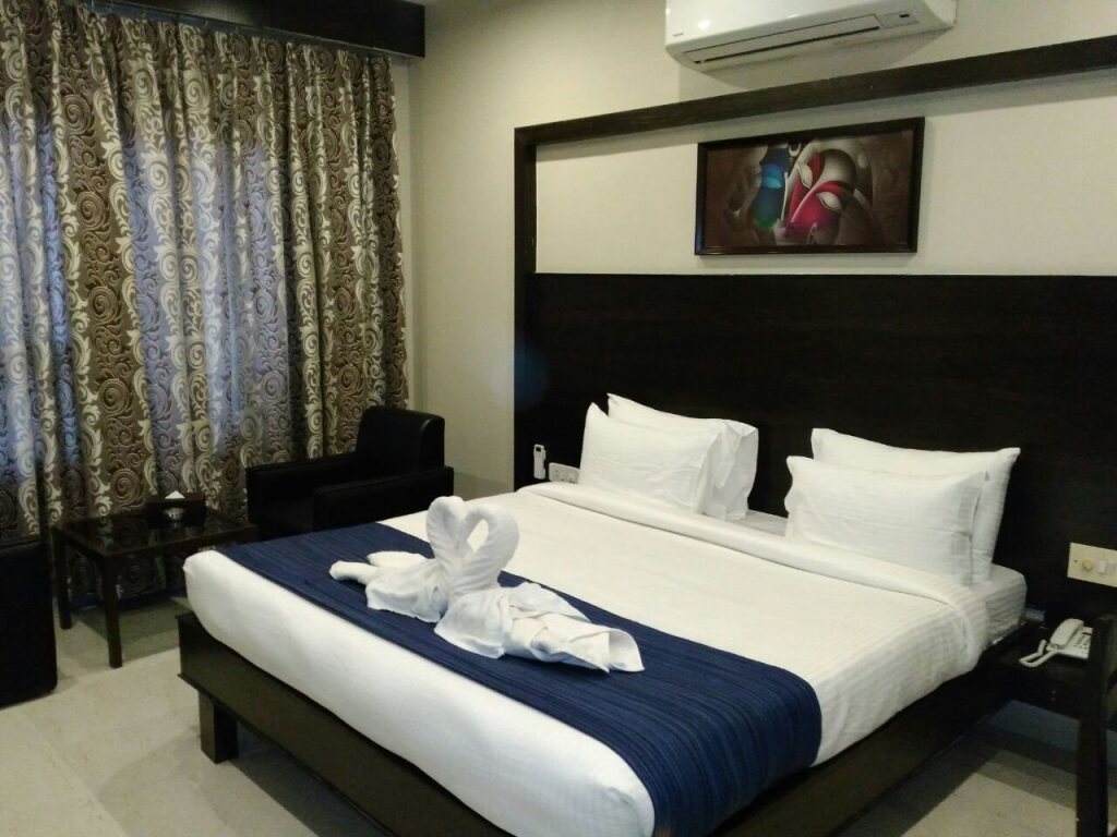 Сатна: Hotel Uma Residency