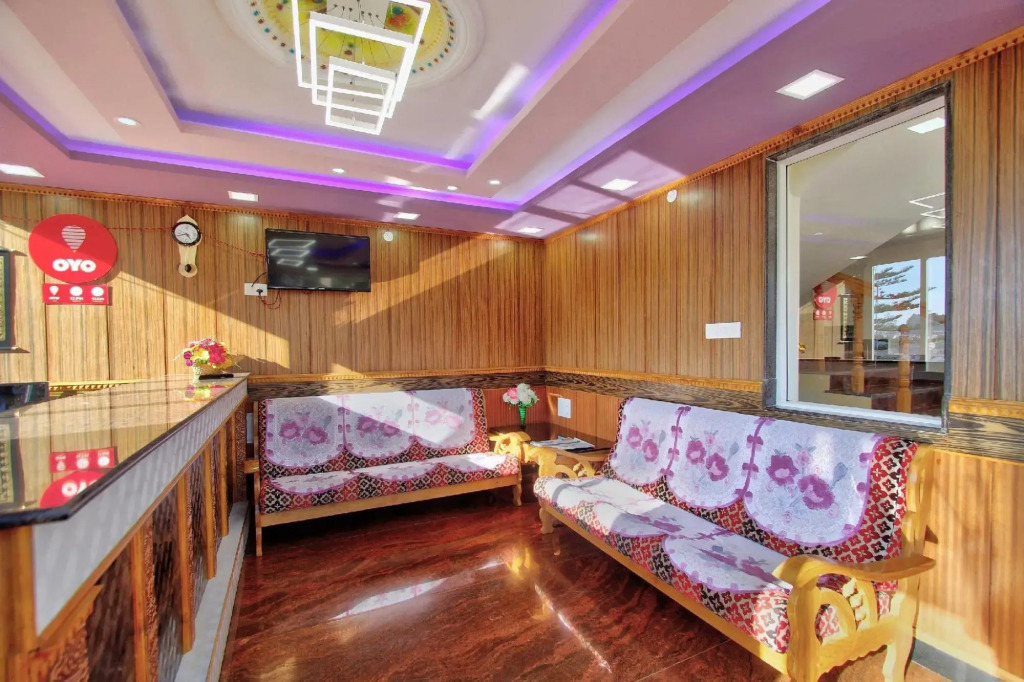 Ути: Capital O 8709 Hotel Rain Forest