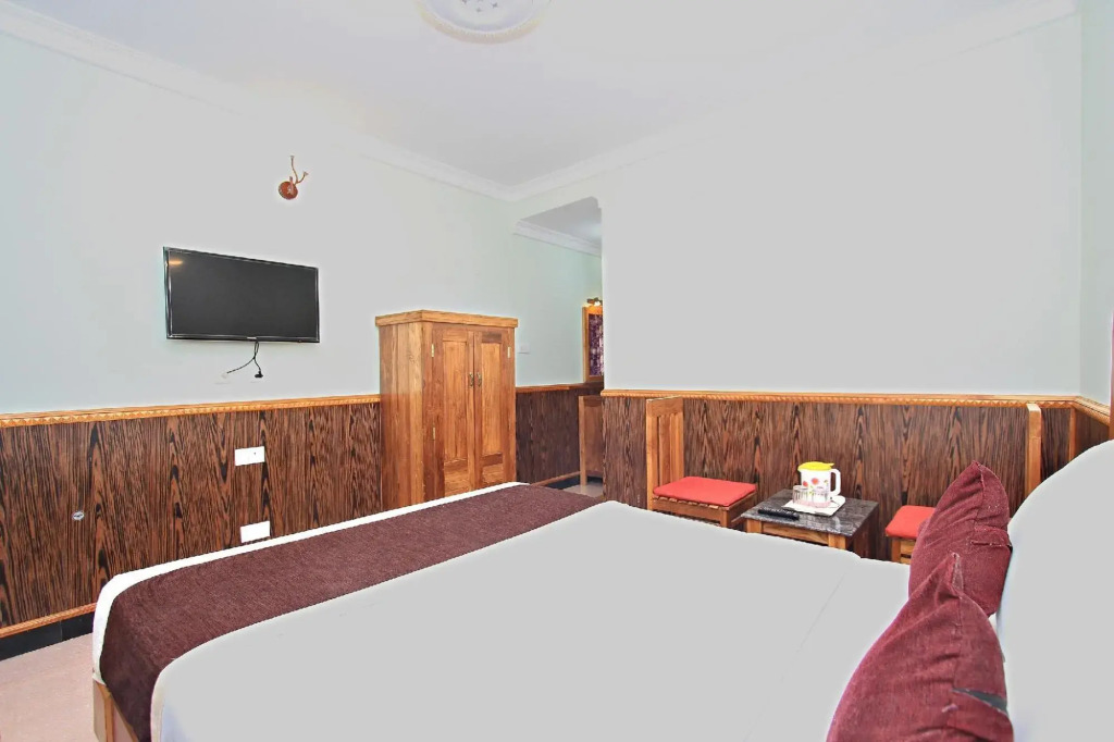 Ути: Capital O 8709 Hotel Rain Forest