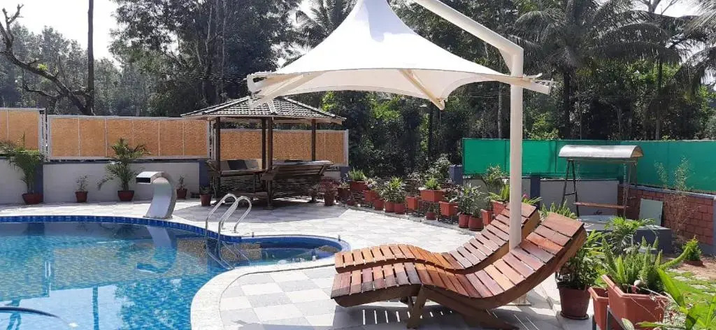 Кушалнагар: Srinikethana Home Stay with Swimming Pool