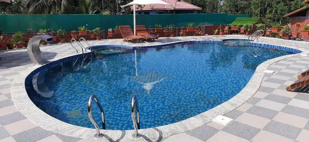 Кушалнагар: Srinikethana Home Stay with Swimming Pool