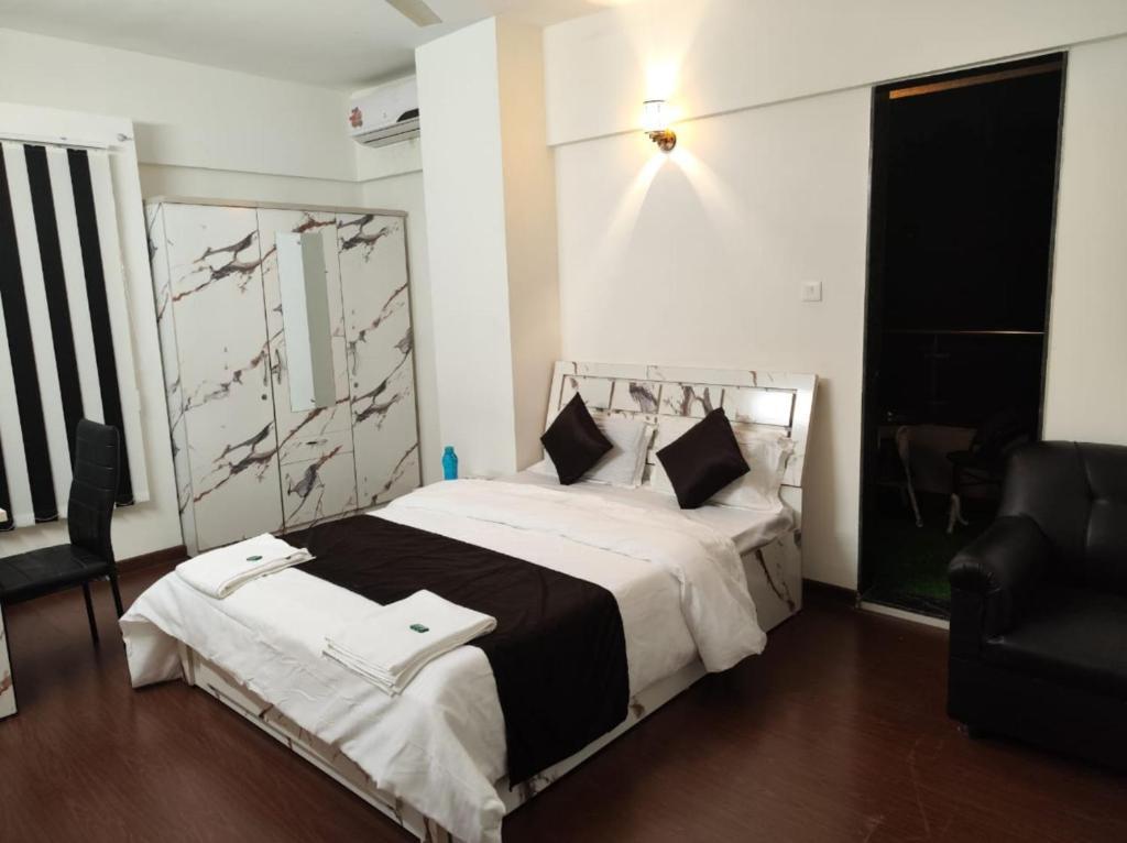 Пуна: Royal Palm Hospitality Services 3