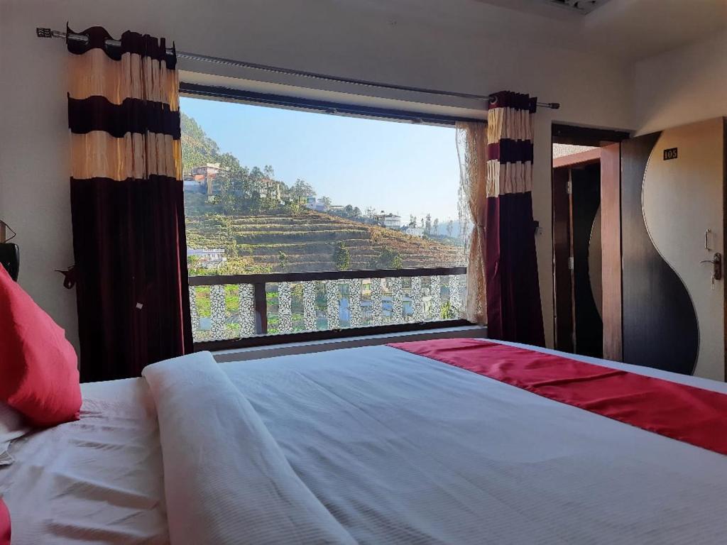 Ути: Sunset Valley Holiday Inn