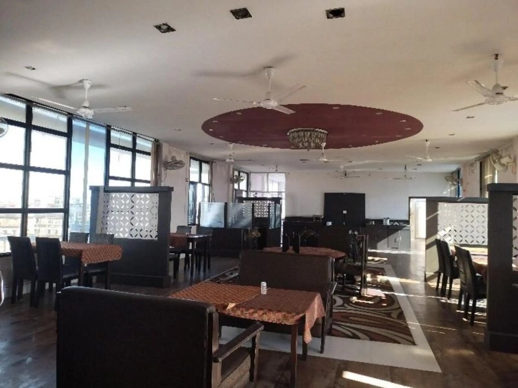 Дибругарх: Capital O 8801 Hotel JS Tower
