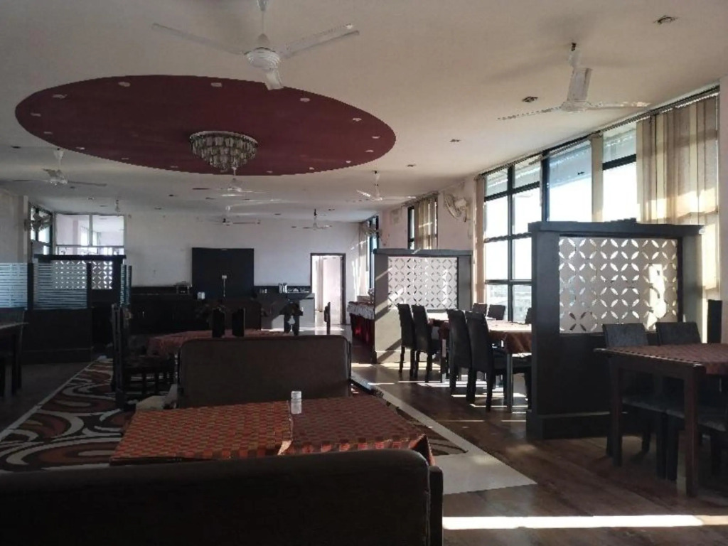Дибругарх: Capital O 8801 Hotel JS Tower