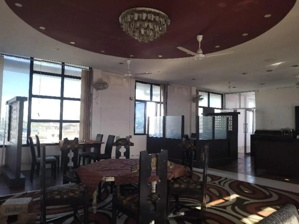 Дибругарх: Capital O 8801 Hotel JS Tower