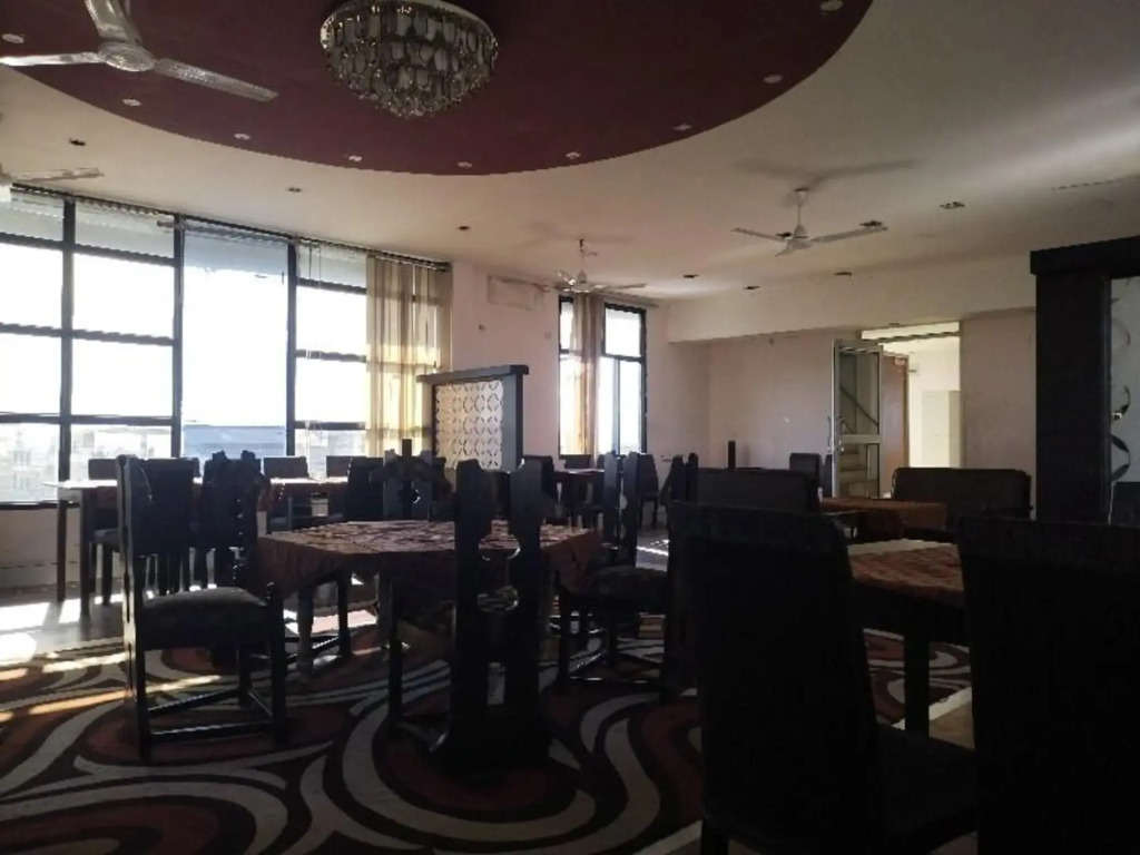 Дибругарх: Capital O 8801 Hotel JS Tower