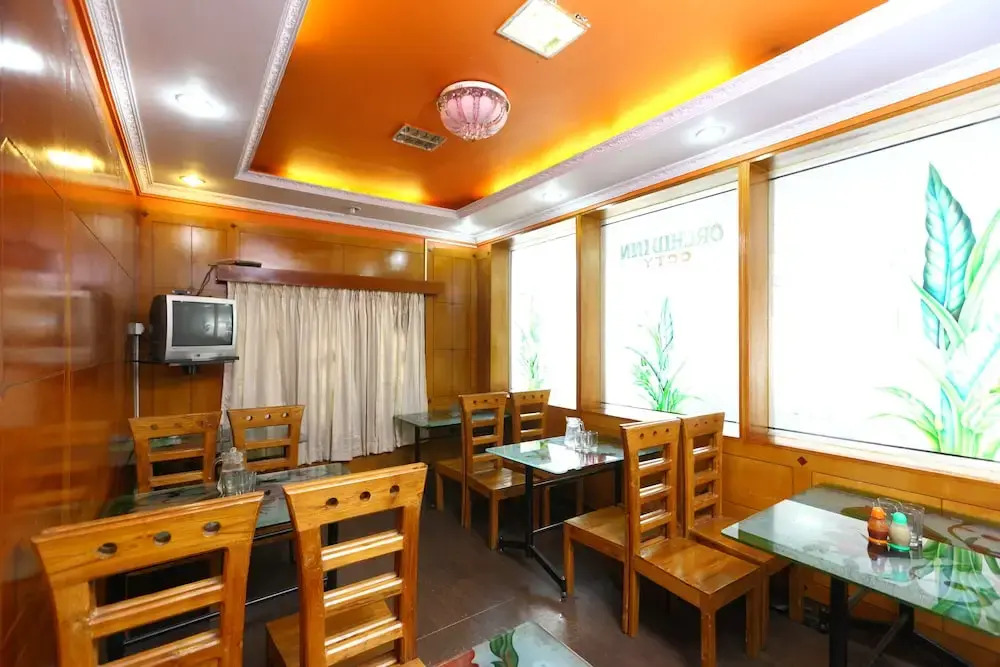 Ути: Collection O 8855 Orchid Inn