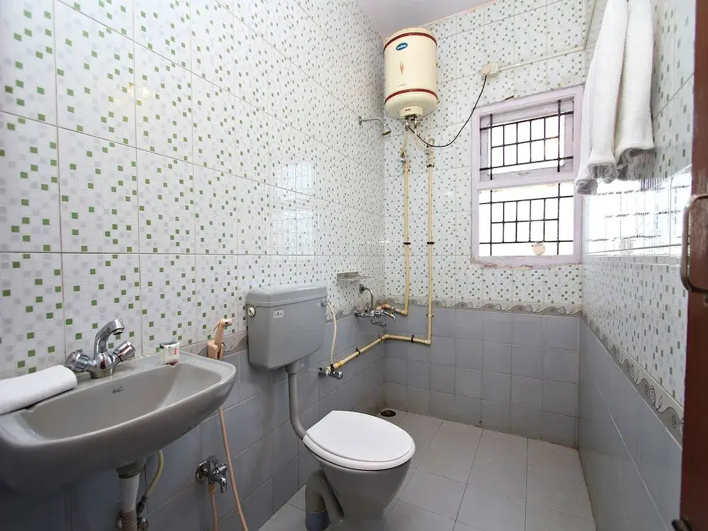 Ути: Collection O 8855 Orchid Inn