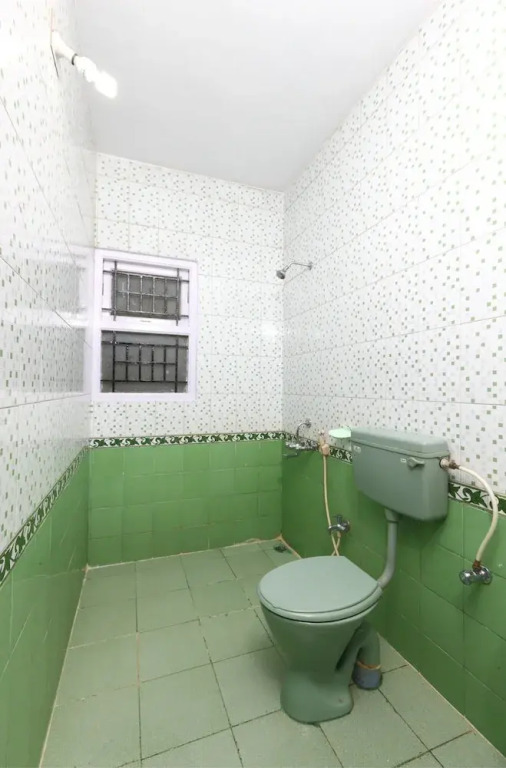 Ути: Collection O 8855 Orchid Inn