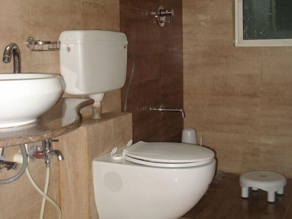 Ахмедабад: 10 Blossoms Hospitality Services