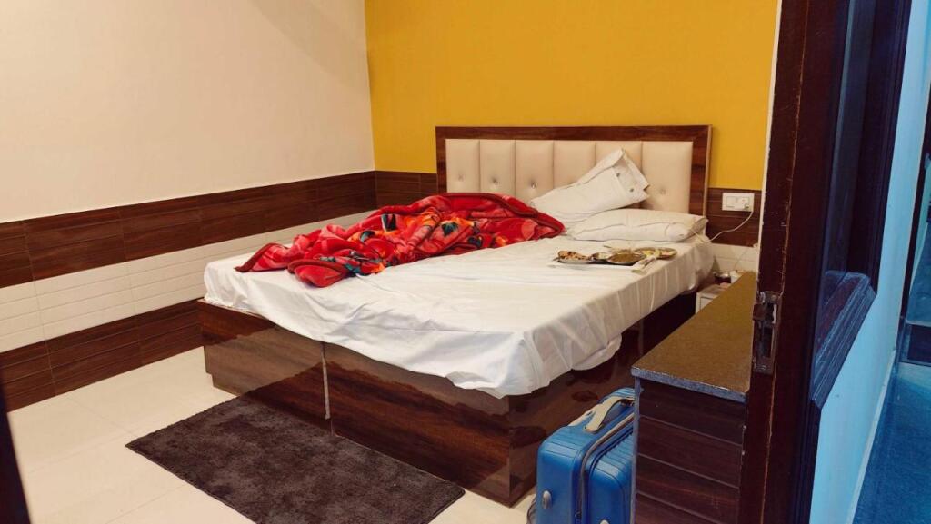 Коси: POP 89785 Hotel Brijwasi Inn