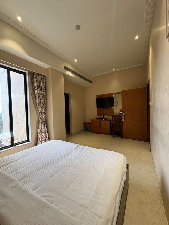 Мумбаи: Hotel Fisco The Hub Link