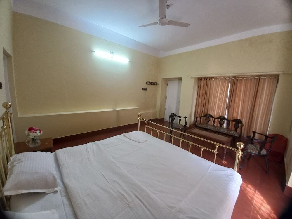 Велламундра: Manikkal Outhouse Cottage Wayanad