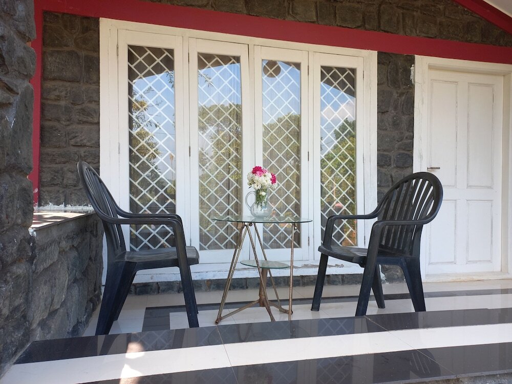 Велламундра: Manikkal Outhouse Cottage Wayanad