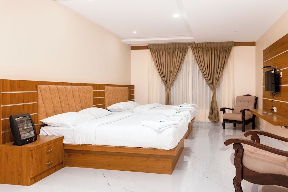 Ути: Grandis Inn By Avkanz