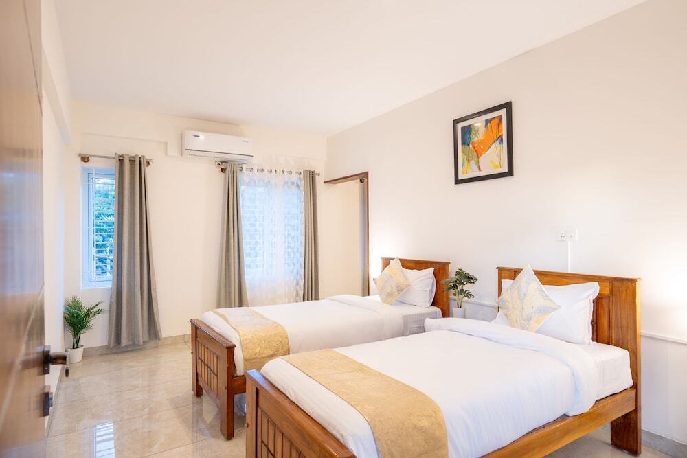 Бангалор: The Silver Chimes Suites